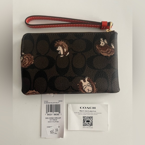 Coach Bags Coach Corner Zip Wristlet In Signature Canvas Hedgehog